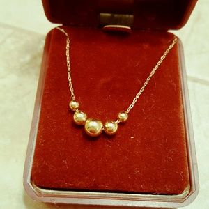 10 carot gold ball necklace